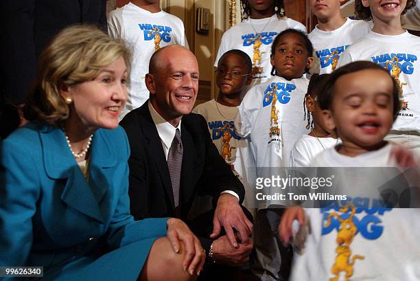 Actor Bruce Willis and Kay Bailey Hutchison, R-Texas, and Jim Bunning, R-Ky., attend a news conference with foster kids Montgomery County Department...