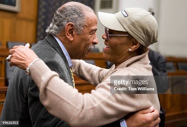 Signer Dionne Warwick greets Rep. John Conyers, D-Mich., before a news conference with the musicFIRST Coalition to announce a expansion of their...