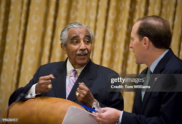 Chairman Charlie Rangel, D-N.Y., left, confers with ranking member Rep. Dave Camp, R-Mich., before a House Ways and Means Committee markup on the...