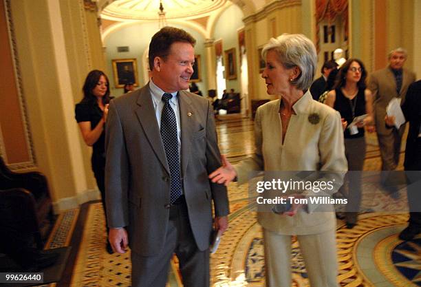 Sen. Jim Webb, D-Va., talks with Kansas Governor Kathleen Sebelius after a news conference to discuss Democrats' efforts to ensure that U.S. Military...