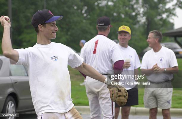 Rep. Anthony Weiner warms up in the Parking lot of Prince George's Stadium. Wednsday morning practice was cut short due to a wet field.