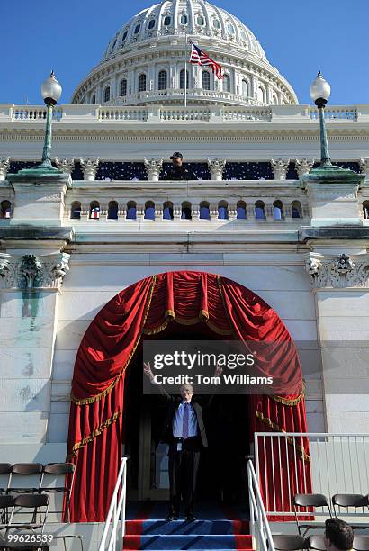 Erik Johnson from the office if Sen. George Voinovich, R-Ohio, poses for a picture on the ceremonial area on the west front of the Capitol where...