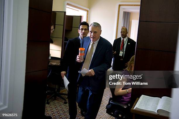 Senate Minority Whip Jon Kyl, R-Ariz., right, and House Minority Whip Eric Cantor, R-Va., arrive in the Senate press gallery to talk to the media...