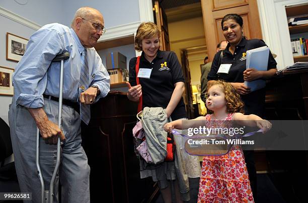 Lili Whitaker of Ferndale, Mich., meets with Rep. John Dingell, D-Mich., as her mother Julie Newland, center, and Maria Thomas, right, C.S. Mott...