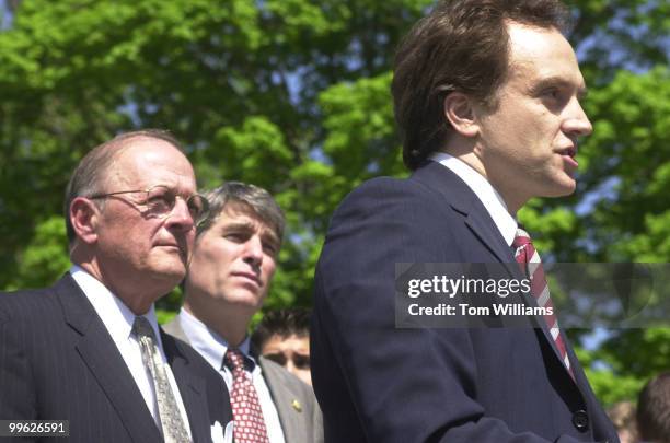 Actor Brad Whitford speaks at a press conference discussing how heavy polluting school buses must be replaced. Reps. Sherwood Boehlert, R-NY, and...