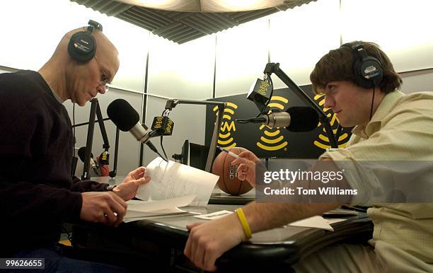 Political consultant James Carville, left, and Luke Russert, son of NBC News' Tim Russert, take a break from taping their new sports radio show at XM...