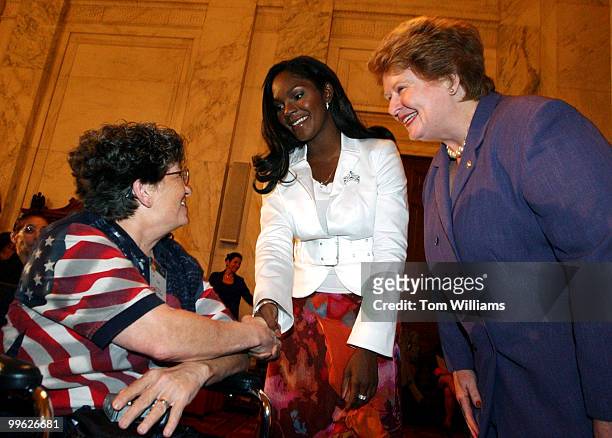 From left, Staff Sergeant Nancy Berger, greets Miss America Erika Dunlap, and Sen. Debbie Stabenow, D-Mich. At an event to commerate the release of...