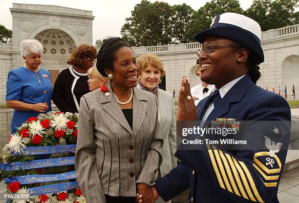 Rep. Sheila Jackson Lee, D-Texas, shares a laugh with Corzetta Calloway of the US Coast Guard after an annual ceremony held by the Congressioanl...