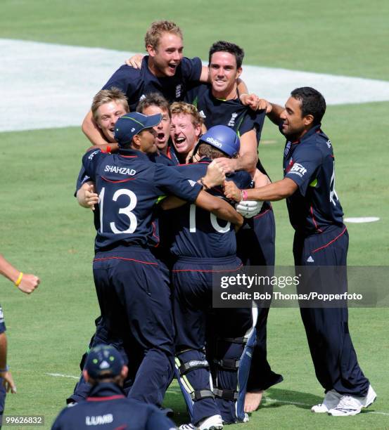 England players mob captain Paul Collingwood after winning the final of the ICC World Twenty20 between Australia and England at the Kensington Oval...