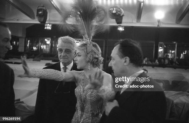 Henri Varna and Line Renaud during his show at the Casino de Paris . In 1959.