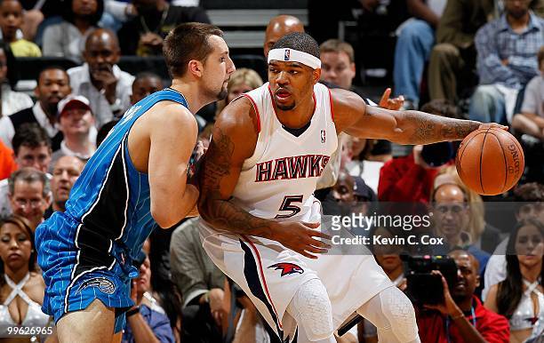 Ryan Anderson of the Orlando Magic against Josh Smith of the Atlanta Hawks during Game Four of the Eastern Conference Semifinals of the 2010 NBA...