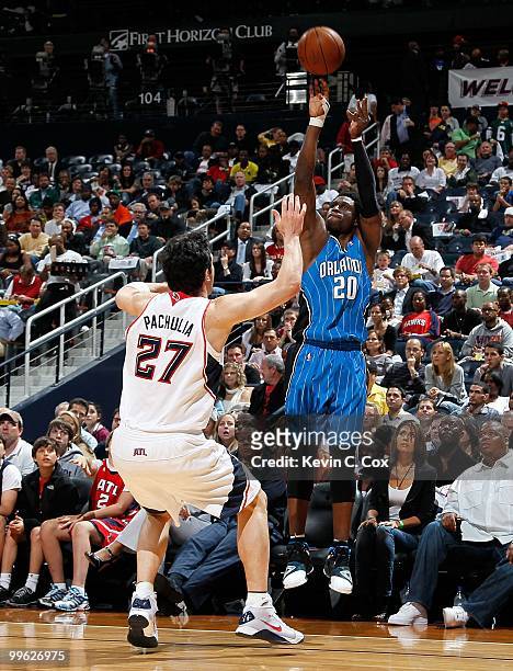Mickael Pietrus of the Orlando Magic against Zaza Pachulia of the Atlanta Hawks during Game Four of the Eastern Conference Semifinals of the 2010 NBA...
