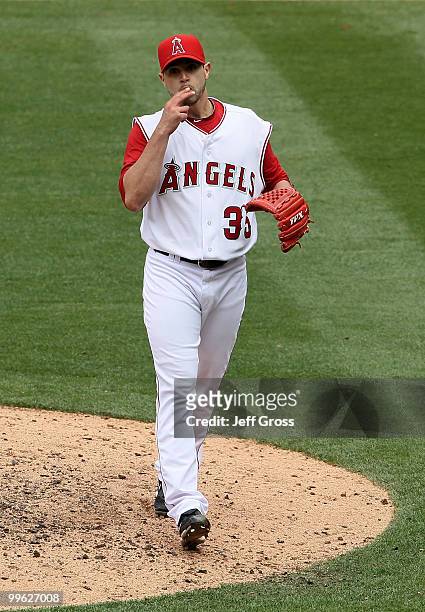 Starting pitcher Joel Pineiro of the Los Angeles Angels of Anaheim celebrates after throwing a complete game shutout against the Oakland Athletics at...