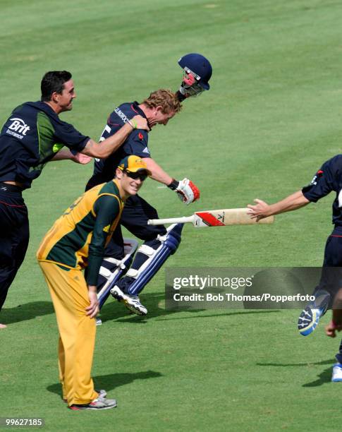 England players mob captain Paul Collingwood as he hit the winning runs in the ICC World Twenty20 between Australia and England at the Kensington...