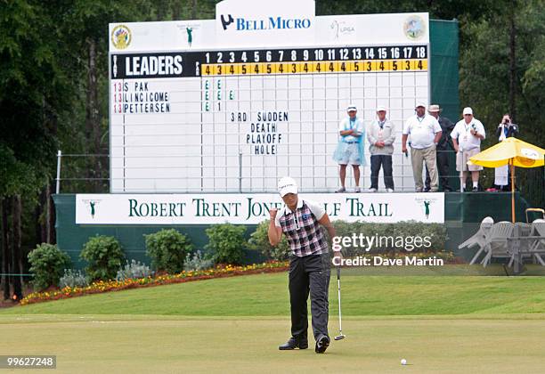 Se Ri Pak of South Korea reacts as her birdie putt falls in the hole during a sudden death playoff in the Bell Micro LPGA Classic at the Magnolia...