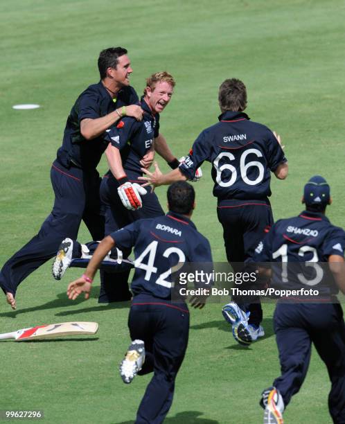 England players mob captain Paul Collingwood as he hit the winning runs in the ICC World Twenty20 between Australia and England at the Kensington...