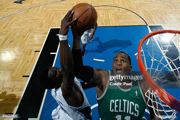 Glen Davis of the Boston Celtics fights for the ball against Mickael Pietrus of the Orlando Magic in Game One of the Eastern Conference Finals during...