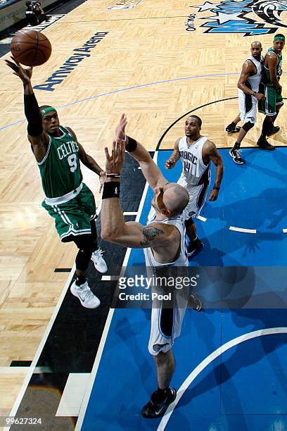 Rajon Rondo of the Boston Celtics drives for a shot attempt against the Orlando Magic in Game One of the Eastern Conference Finals during the 2010...