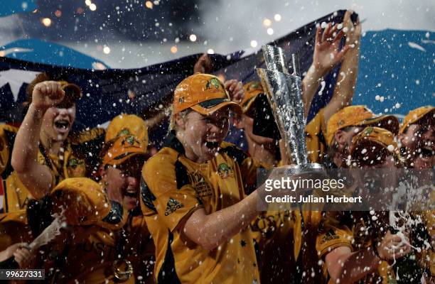 Alex Blackwell, the captain of Australia, is showered with champagne after her teams victory in the ICC Womens World Twenty20 Final between Australia...