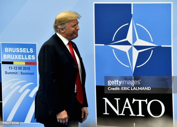 President Donald Trump arrives for the NATO summit, at the NATO headquarters in Brussels, on July 11, 2018.