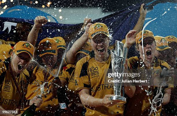 Alex Blackwell, the captain of Australia, is showered with champagne after her teams victory in the ICC Womens World Twenty20 Final between Australia...