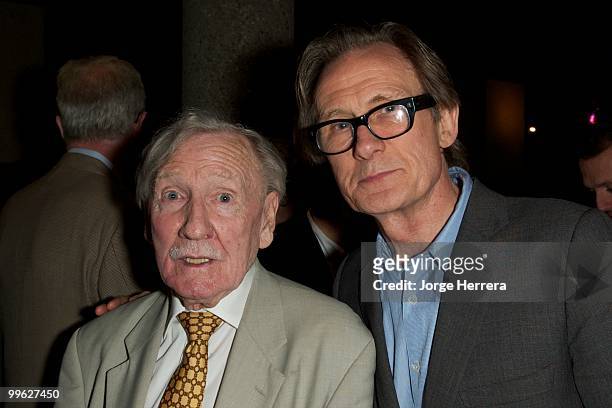 Actors Leslie Phillips and Bill Nighy attend the afterparty for The Laws of War presented by Human Rights Watch at the Royal Court Theatre on May 16,...