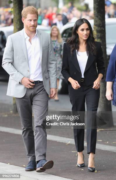 Prince Harry, Duke of Sussex and Meghan, Duchess of Sussex arrive at the Famine Memorial on the bank of the River Liffey during their visit to...