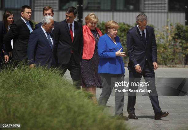 German Chancellor Angela Merkel, NATO Secretary General Jens Stoltenberg and other heads of state arrive for the opening ceremony at the 2018 NATO...