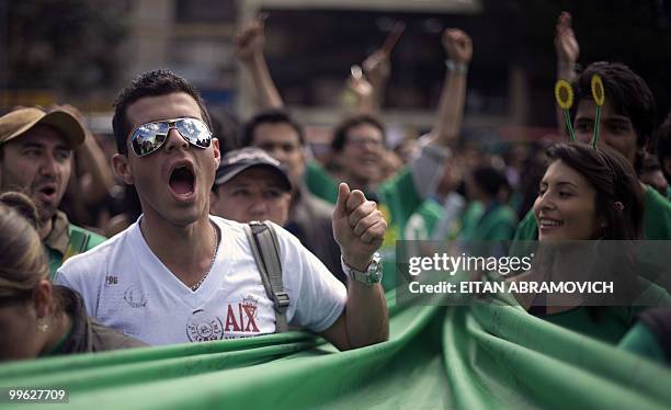 Supporters of Colombian presidential candidate for the Green Party, Antanas Mockus, attend a rally in Bogota on May 16, 2010. Colombia will hold...