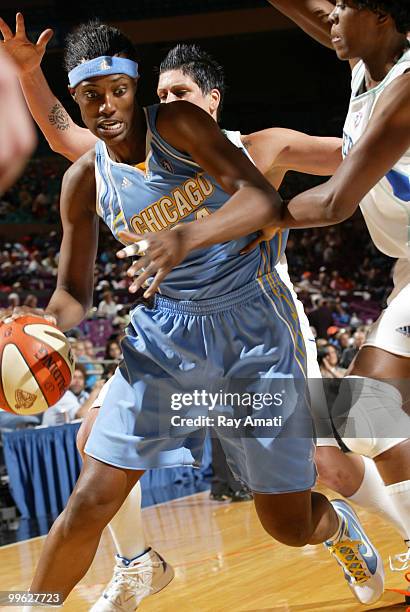 Sylvia Fowles of the Chicago Sky drives against Taj McWilliams-Franklin of the New York Liberty during the game on May 16, 2010 at Madison Square...