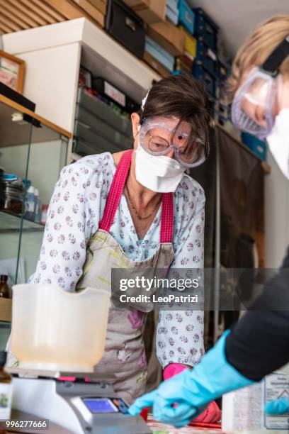 handmade soap making workshop in a studio - leo patrizi stock pictures, royalty-free photos & images