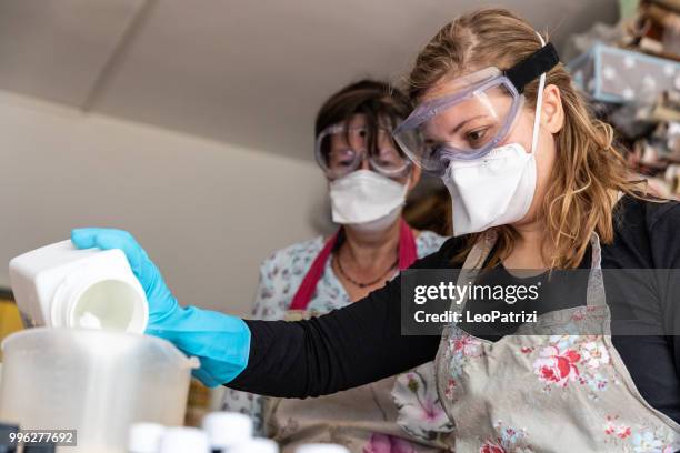 handmade soap making workshop in a studio - leo patrizi stock pictures, royalty-free photos & images