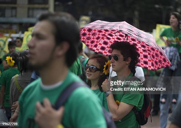 Supporters of Colombian presidential candidate for the Green Party, Antanas Mockus, attend a rally in Bogota on May 16, 2010. Colombia will hold...
