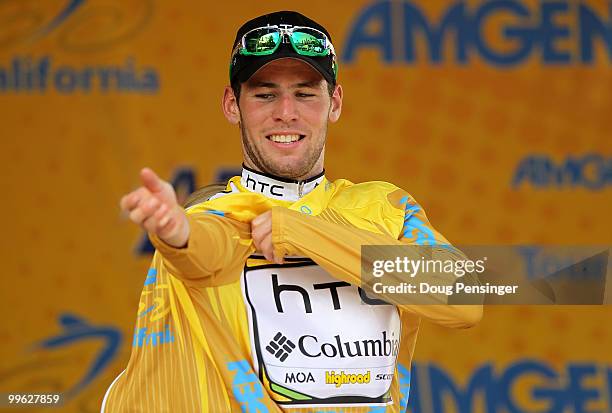 Mark Cavendish of Great Britain and riding for HTC-Columbia puts on the yellow jersey after winning Stage One of the 2010 Tour of California from...