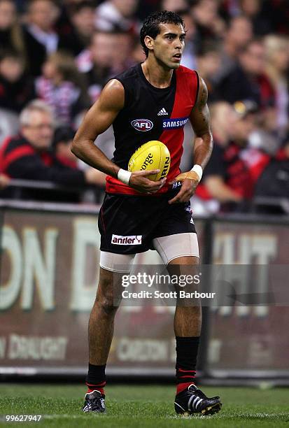 Courtenay Dempsey of the Bombers runs with the ball during the round eight AFL match between the St Kilda Saints and the Essendon Bombers at Etihad...