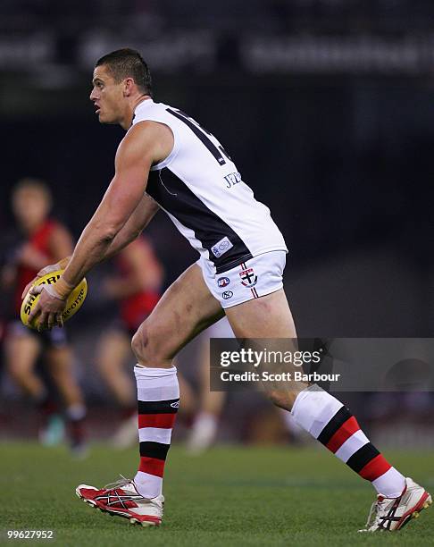 Michael Gardiner of the Saints runs with the ball during the round eight AFL match between the St Kilda Saints and the Essendon Bombers at Etihad...