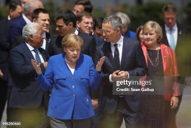 German Chancellor Angela Merkel, NATO Secretary General Jens Stoltenberg and other heads of state arrive for the opening ceremony at the 2018 NATO...