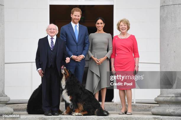 Prince Harry, Duke of Sussex and Meghan, Duchess of Sussex meet President Michael Higgins and his wife Sabina Coyne at Aras an Uachtarain during...