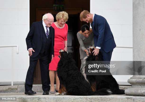 Prince Harry, Duke of Sussex and Meghan, Duchess of Sussex meet President Michael Higgins and his wife Sabina Coyne at Aras an Uachtarain during...