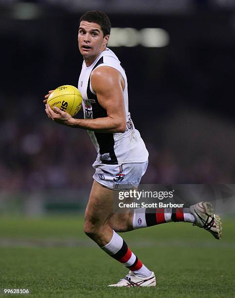 Leigh Montagna of the Saints runs with the ball during the round eight AFL match between the St Kilda Saints and the Essendon Bombers at Etihad...