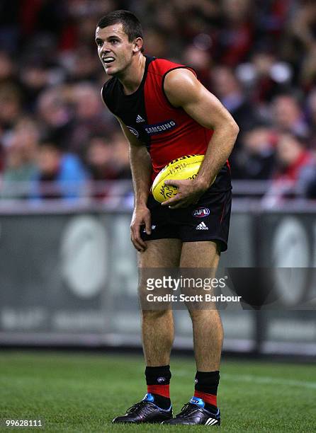 Brent Stanton of the Bombers runs with the ball during the round eight AFL match between the St Kilda Saints and the Essendon Bombers at Etihad...