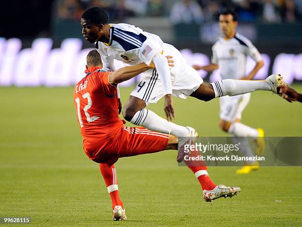 Edson Buddle of Los Angeles Galaxy in action against Adrian Cann of Toronto FC during the first half of the MLS soccer match on May 15, 2010 at the...