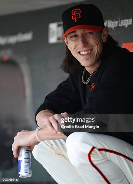 Tim Lincecum of the San Francisco Giants sits in the dugout with a Red Bull energy drink during the game against the Houston Astros at AT&T Park on...