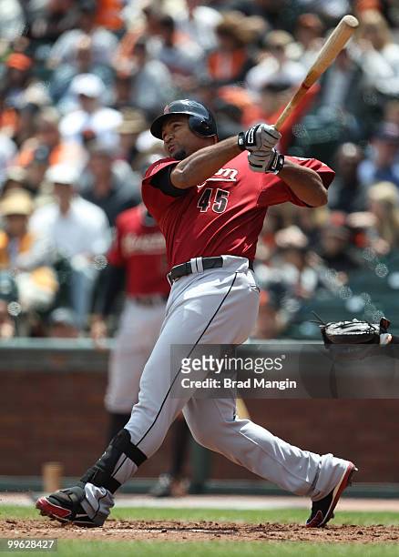 Carlos Lee of the Houston Astros hits a home run against the San Francisco Giants during the game at AT&T Park on May 16, 2010 in San Francisco,...