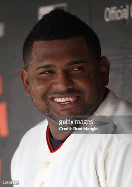 Pablo Sandoval of the San Francisco Giants smiles in the dugout during the game against the Houston Astros at AT&T Park on May 16, 2010 in San...