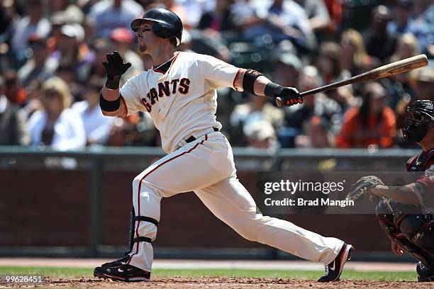 Aaron Rowand of the San Francisco Giants hits a home run against the Houston Astros during the game at AT&T Park on May 16, 2010 in San Francisco,...