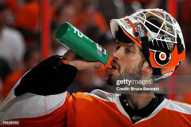 Michael Leighton of the Philadelphia Flyers takes a drink during a break in play against the Montreal Canadiens in Game 1 of the Eastern Conference...