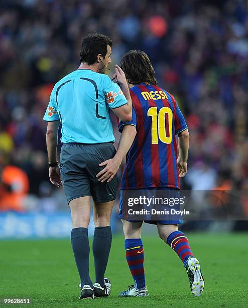 Referee Perez Lasa has a word with Lionel Messi of Barcelona during the La Liga match between Barcelona and Real Valladolid at Camp Nou stadium on...