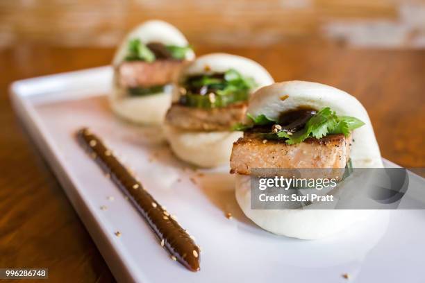 lucky belly pork belly buns - suzi pratt stock pictures, royalty-free photos & images