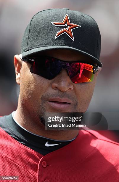Carlos Lee of the Houston Astros stands in the dugout during the game against the San Francisco Giants at AT&T Park on May 16, 2010 in San Francisco,...